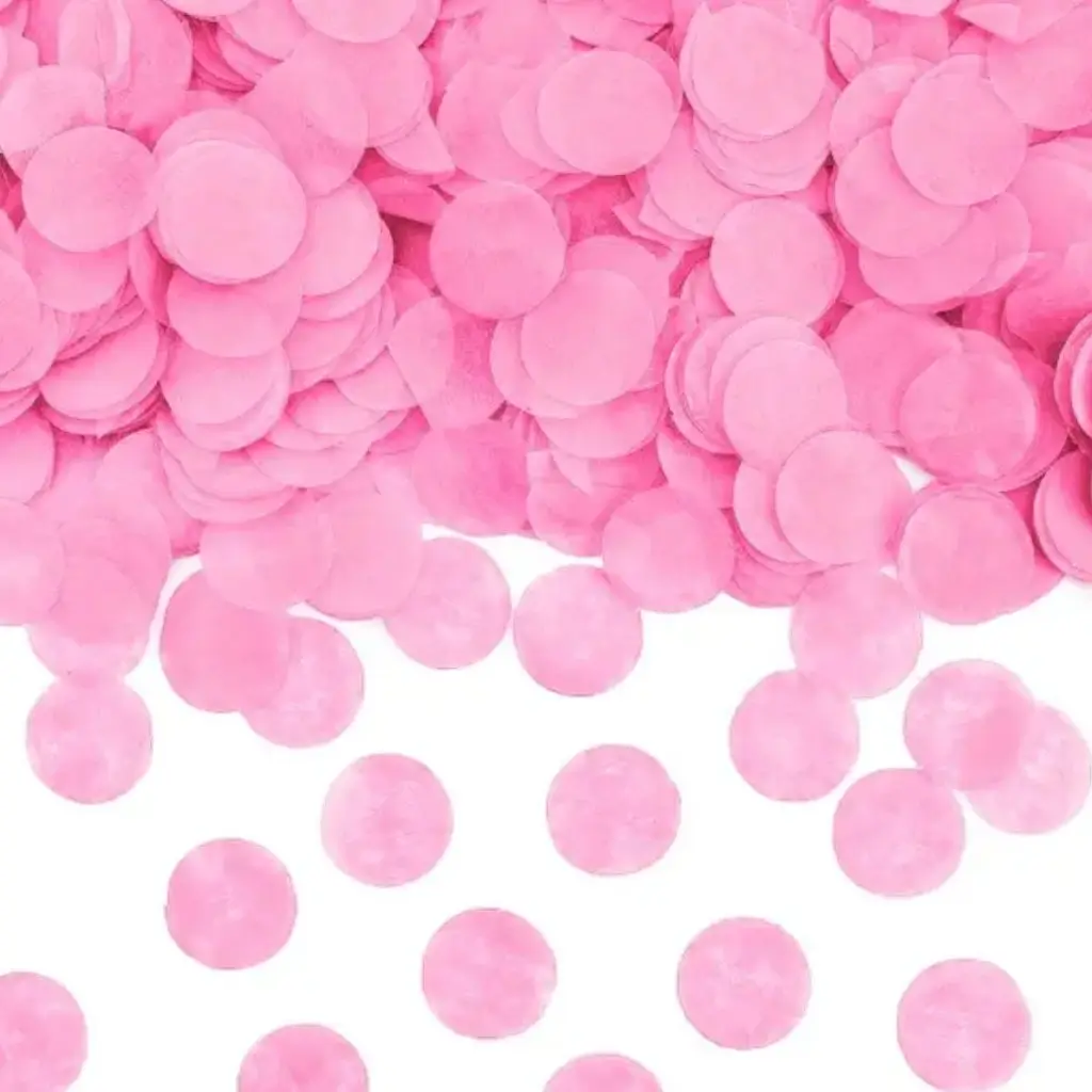 El género gigante revela el cañón de confeti rosa
